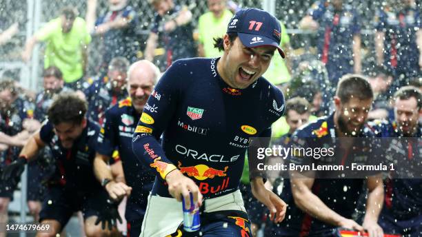 Race winner Sergio Perez of Mexico and Oracle Red Bull Racing and the Red Bull Racing team celebrate after the F1 Grand Prix of Saudi Arabia at...