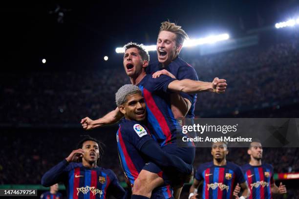 Sergi Roberto of FC Barcelona celebrates with his teammates Ronald Araujo and Frenkie de Jong after scoring the team’s first goal during the LaLiga...