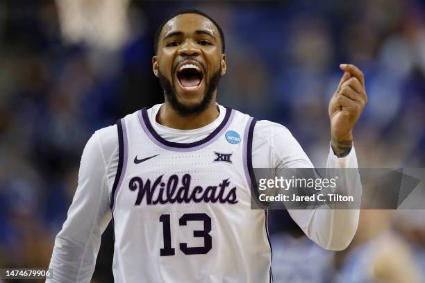 Desi Sills of the Kansas State Wildcats celebrates after defeating the Kentucky Wildcats 75-69 in the second round of the NCAA Men's Basketball...