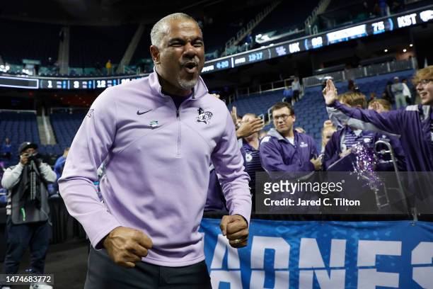 Head coach Jerome Tang of the Kansas State Wildcats celebrates after defeating the Kentucky Wildcats 75-69 in the second round of the NCAA Men's...
