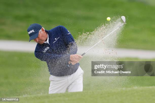 Fred Couples of the United States hits out of the sand on the first hole during the final round of the Hoag Classic at Newport Beach Country Club on...