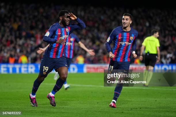 Franck Kessie of FC Barcelona celebrates after scoring the team's second goal during the LaLiga Santander match between FC Barcelona and Real Madrid...