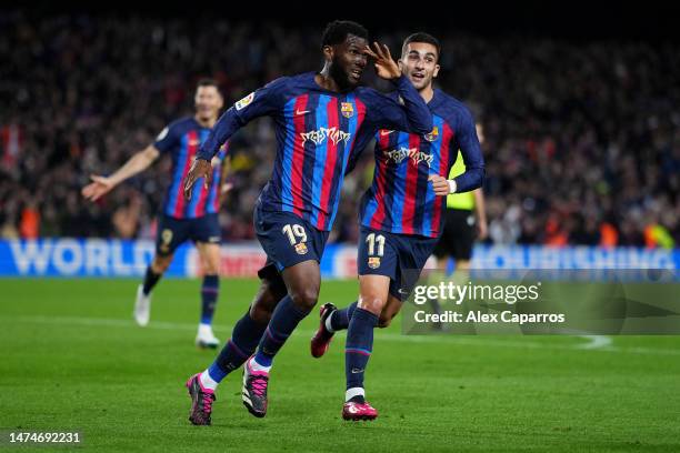 Franck Kessie of FC Barcelona celebrates after scoring the team's second goal during the LaLiga Santander match between FC Barcelona and Real Madrid...