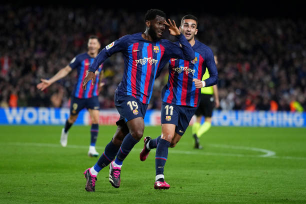 Franck Kessie of FC Barcelona celebrates after scoring the team's second goal during the LaLiga Santander match between FC Barcelona and Real Madrid...