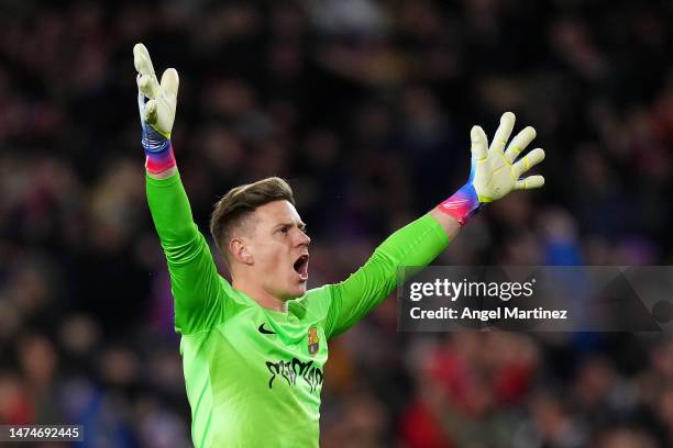 Marc-Andre ter Stegen of FC Barcelona celebrates their side's second goal scored by Franck Kessie of FC Barcelona during the LaLiga Santander match...