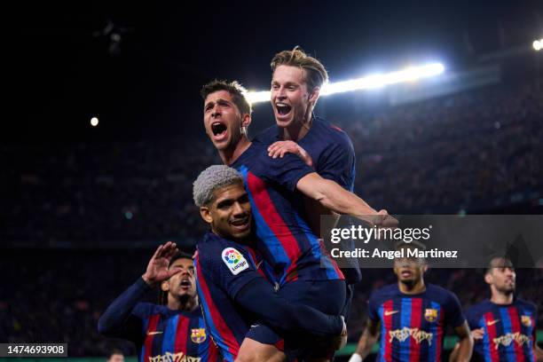 Sergi Roberto of FC Barcelona celebrates with his teammates Ronald Araujo and Frenkie de Jong after scoring the team’s first goal during the LaLiga...