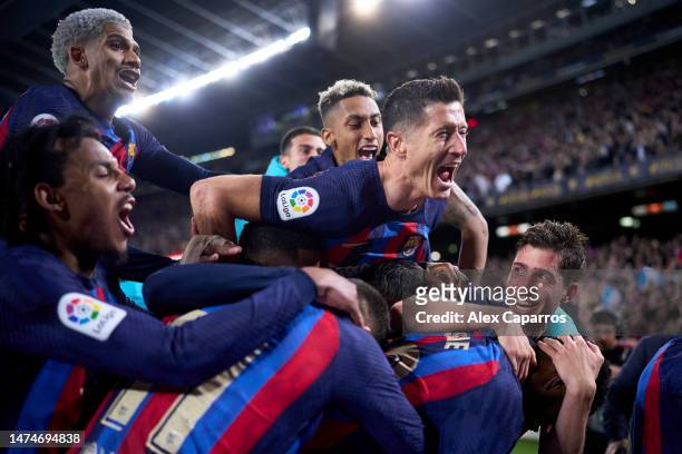Franck Kessie of FC Barcelona celebrates with Robert Lewandowski and team mates after scoring the team's second goal during the LaLiga Santander...