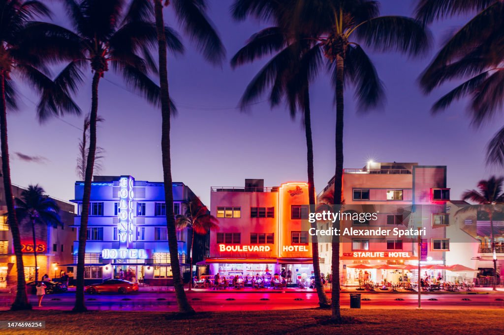 Neon light illuminated buildings along Ocean Drive in Miami, Florida, USA