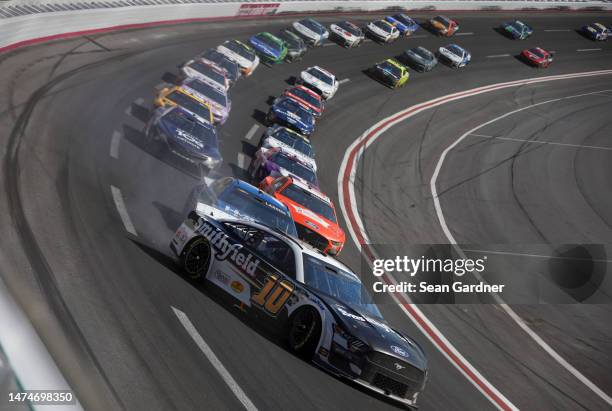 Aric Almirola, driver of the Smithfield Ford, spins after an on-track incident during the NASCAR Cup Series Ambetter Health 400 at Atlanta Motor...