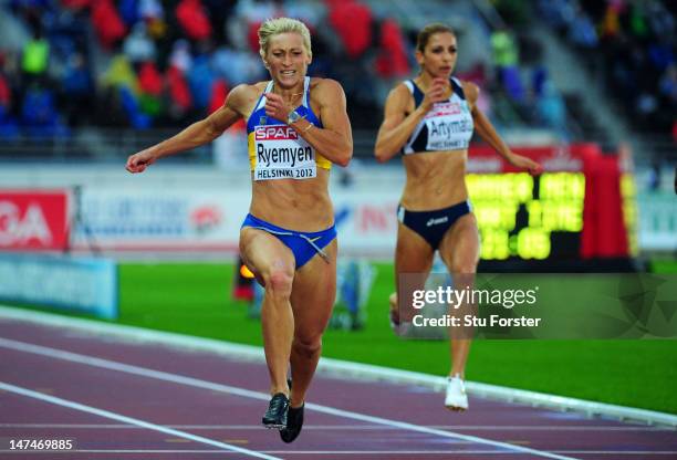 Mariya Ryemyen of Ukraine crosses the line to win the Women's 200 Metres Final during day four of the 21st European Athletics Championships at the...