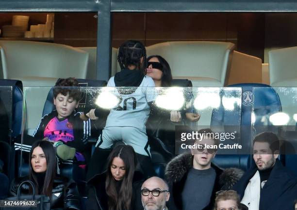Kim Kardashian holding her son Saint West during the Ligue 1 Uber Eats match between Paris Saint-Germain and Stade Rennais at Parc des Princes...