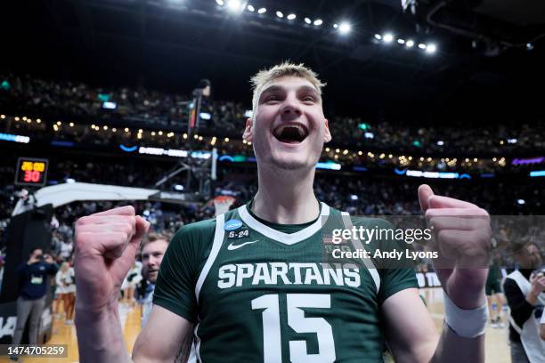 Carson Cooper of the Michigan State Spartans celebrates after defeating the Marquette Golden Eagles in the second round game of the NCAA Men's...