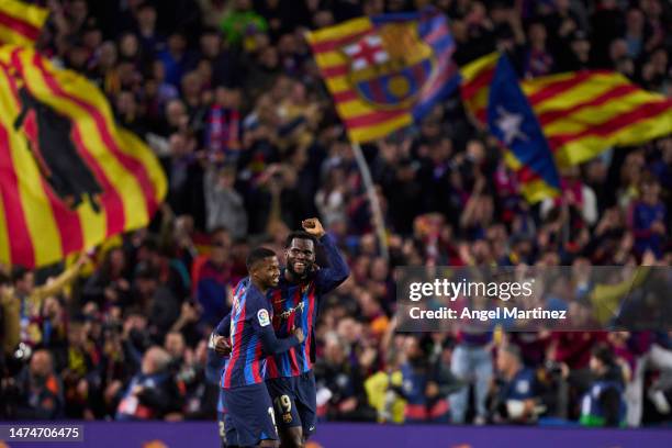 Franck Kessie of FC Barcelona celebrates with his teammate Ansu Fati of FC Barcelona after scoring his team's second goal during the LaLiga Santander...