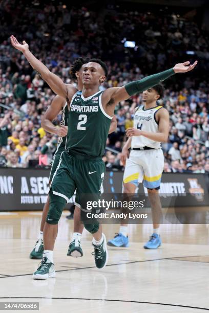 Tyson Walker of the Michigan State Spartans celebrates after defeating the Marquette Golden Eagles in the second round game of the NCAA Men's...