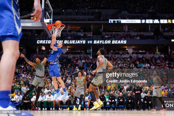 Ryan Kalkbrenner of the Creighton Bluejays dunks during the first half against the Baylor Bears in the second round of the NCAA Men's Basketball...