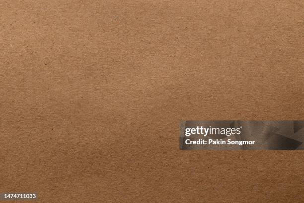 brown paper sheet texture cardboard background. - brown suit foto e immagini stock