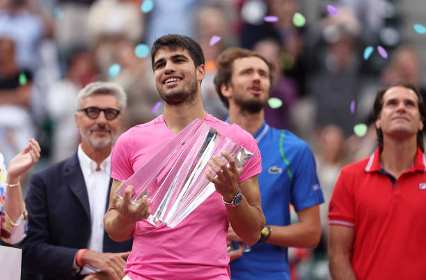 Carlos Alcaraz of Spain with the winners trophy after defeating Daniil Medvedev in the final during the BNP Paribas Open on March 19, 2023 in Indian...