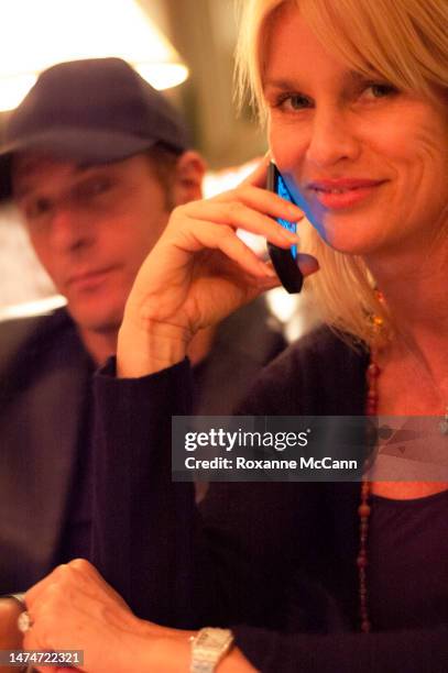 Singer/songwriter Michael Bolton sits with actress Nicollette Sheridan of "Desperate Housewives" on ABC in the Polo Lounge on April 28, 2006 in...