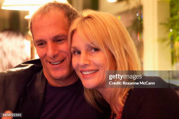 Singer/songwriter Michael Bolton sits with actress Nicollette Sheridan of "Desperate Housewives" on ABC in the Polo Lounge on April 28, 2006 in...