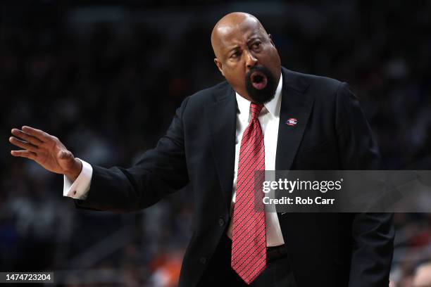 Head coach Mike Woodson of the Indiana Hoosiers reacts in the first half against the Miami Hurricanes during the second round of the NCAA Men's...