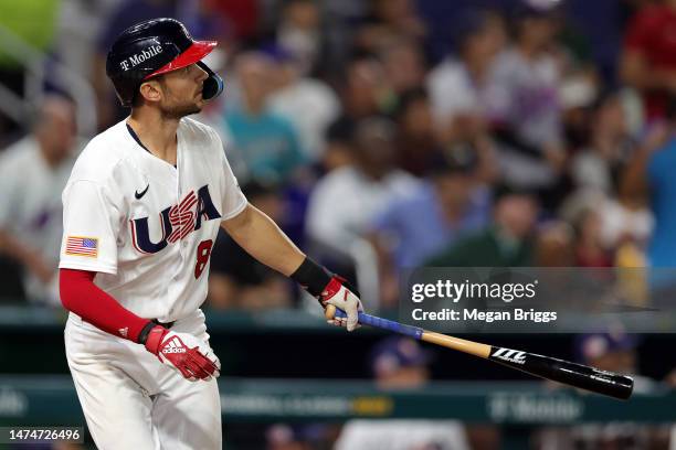 Trea Turner of Team USA looks on after hitting a three-run home run in the sixth inning against Team Cuba during the World Baseball Classic...