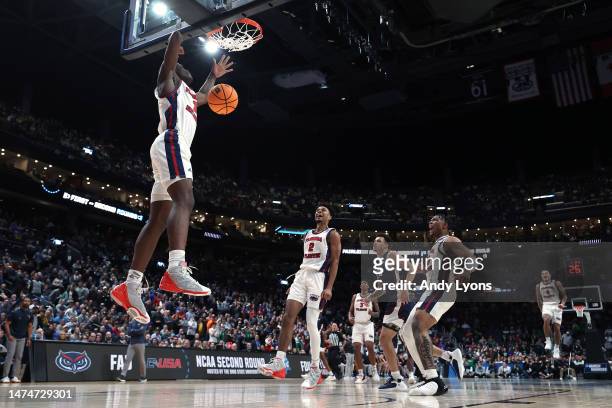 Johnell Davis of the Florida Atlantic Owls dunks the ball against the Fairleigh Dickinson Knights during the second half in the second round game of...