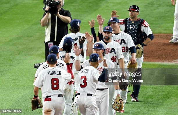 Team USA celebrates after winning the World Baseball Classic Semifinals between Cuba and United States at loanDepot park on March 19, 2023 in Miami,...