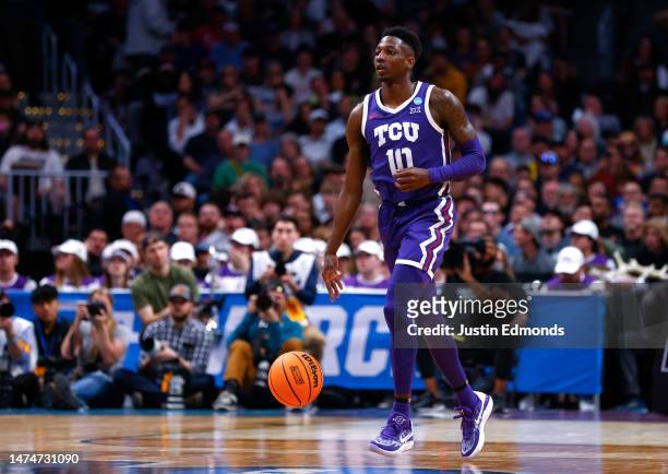 Damion Baugh of the TCU Horned Frogs dribbles the ball during the first half against the Gonzaga Bulldogs in the second round of the NCAA Men's...