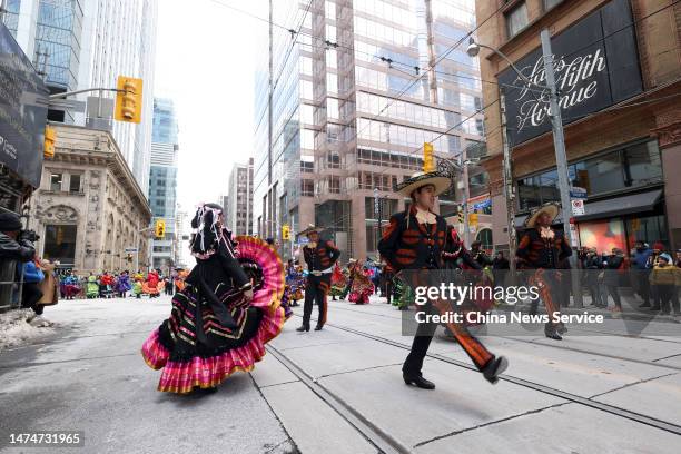 Mexican dancers march in the St. Patrick's Day Parade on March 19, 2023 in March 19, 2023 in Toronto, Canada.