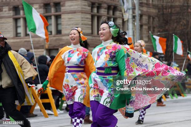 Japanese dancers march in the St. Patrick's Day Parade on March 19, 2023 in March 19, 2023 in Toronto, Canada.