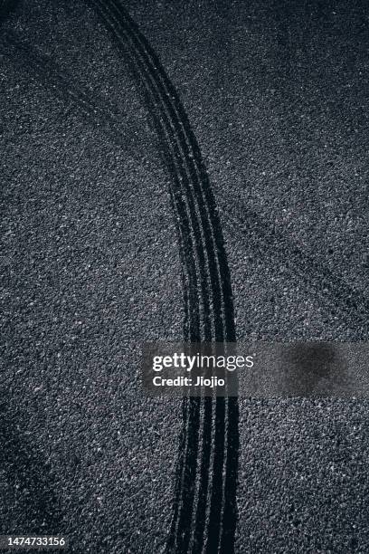 racing track covered with tire marks - skid mark stock pictures, royalty-free photos & images