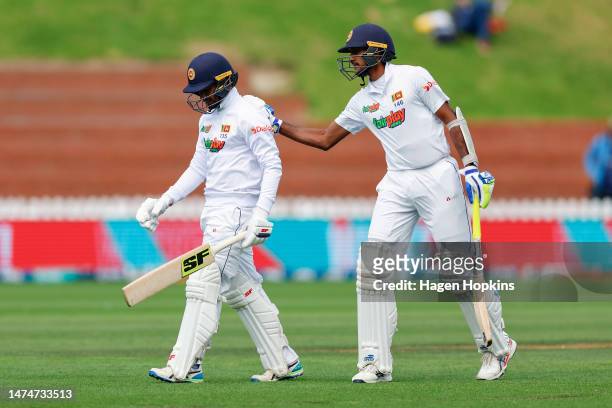 Dhananjaya De Silva of Sri Lanka is consoled by Kasun Rajitha of Sri Lanka after being dismissed for 98 runs during day four of the Second Test Match...