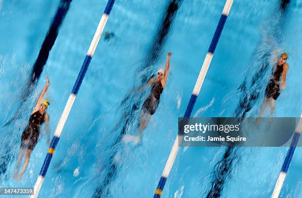 Heidi Hatteberg, Kim Holden and Aubrey Peacock compete in preliminary heat 5 of the Women's 200 m Backstroke during Day Six of the 2012 U.S. Olympic...