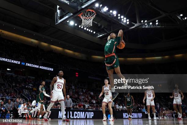 Isaiah Wong of the Miami Hurricanes goes up for a dunk in the second half against the Indiana Hoosiers during the second round of the NCAA Men's...