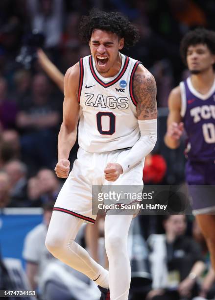 Julian Strawther of the Gonzaga Bulldogs reacts after a three point basket during the second half against the TCU Horned Frogs in the second round of...