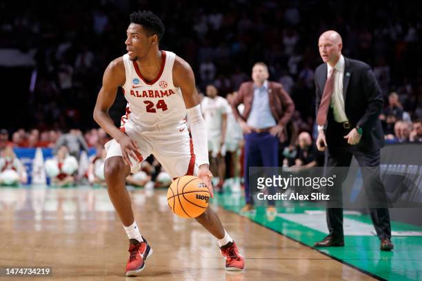 Brandon Miller of the Alabama Crimson Tide drives during the first half against the Maryland Terrapins in the second round of the NCAA Men's...