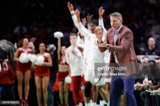 Head coach Nate Oats of the Alabama Crimson Tide celebrates during the first half against the Maryland Terrapins in the second round of the NCAA...