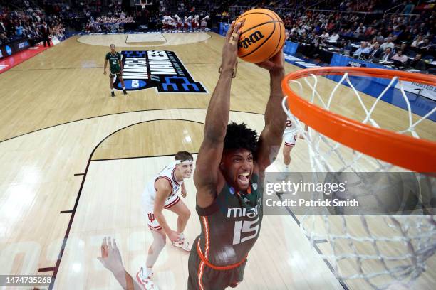 Norchad Omier of the Miami Hurricanes dunks in the second half against the Indiana Hoosiers during the second round of the NCAA Men's Basketball...