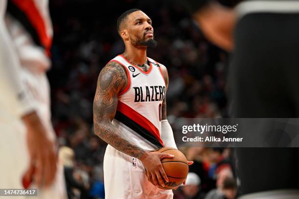 Damian Lillard of the Portland Trail Blazers eyes the basket before shooting a free throw during the third quarter against the LA Clippers at the...