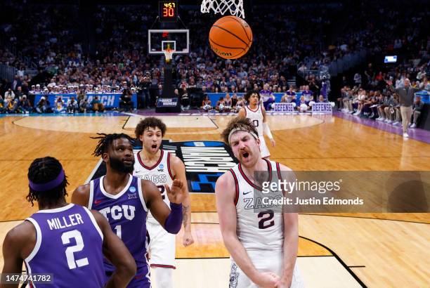 Drew Timme of the Gonzaga Bulldogs reacts after a basket during the second half against the TCU Horned Frogs in the second round of the NCAA Men's...