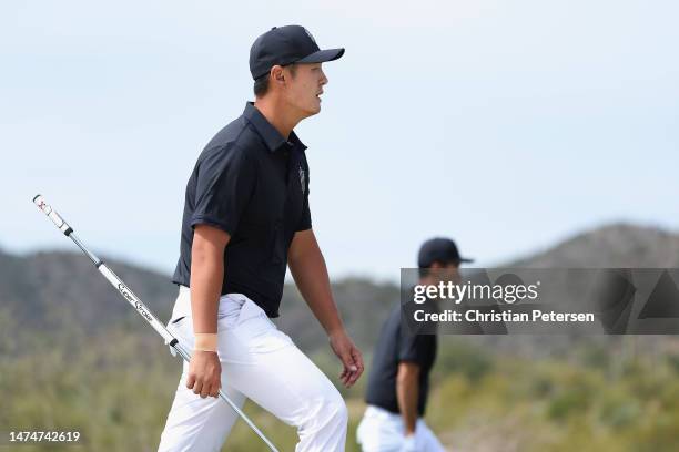 Danny Lee and Kevin Na of Iron Heads GC walk to the 16th green during Day Three of the LIV Golf Invitational - Tucson at The Gallery Golf Club on...