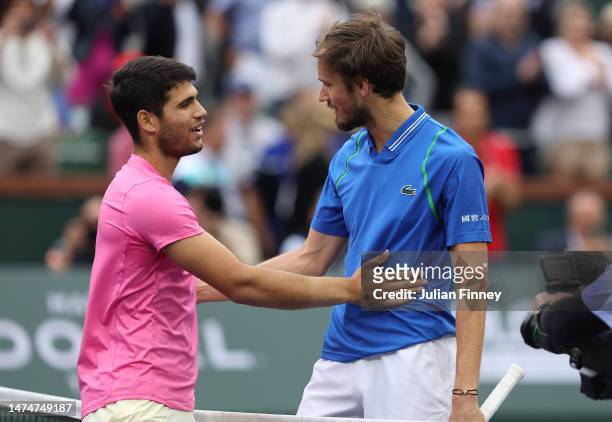 Carlos Alcaraz of Spain is congratulated by Daniil Medvedev after his win in the final during the BNP Paribas Open on March 19, 2023 in Indian Wells,...