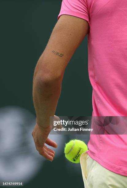 Detail shot of Carlos Alcaraz of Spain's tattoo against Daniil Medvedev in the final during the BNP Paribas Open on March 19, 2023 in Indian Wells,...