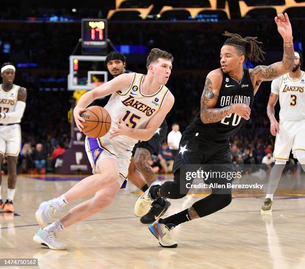 Austin Reaves of the Los Angeles Lakers drives to the basket against Markelle Fultz of the Orlando Magic during the second half at Crypto.com Arena...