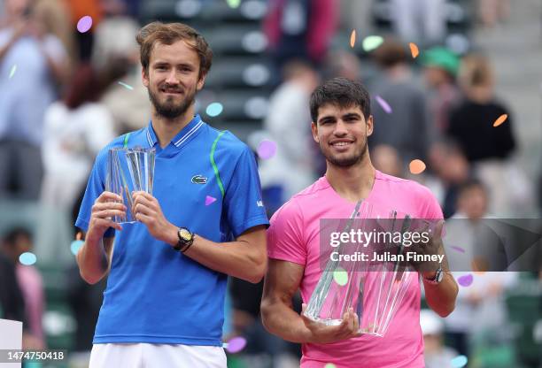 Winner Carlos Alcaraz of Spain with runner upDaniil Medvedev after the final during the BNP Paribas Open on March 19, 2023 in Indian Wells,...