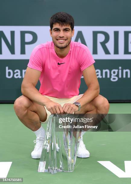 Carlos Alcaraz of Spain with the winners trophy after defeating Daniil Medvedev in the final during the BNP Paribas Open on March 19, 2023 in Indian...