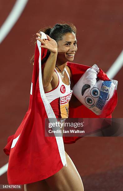 Nevin Yanit of Turkey celebrates winning gold in the Women's 100 Metres Hurdles Final during day four of the 21st European Athletics Championships at...