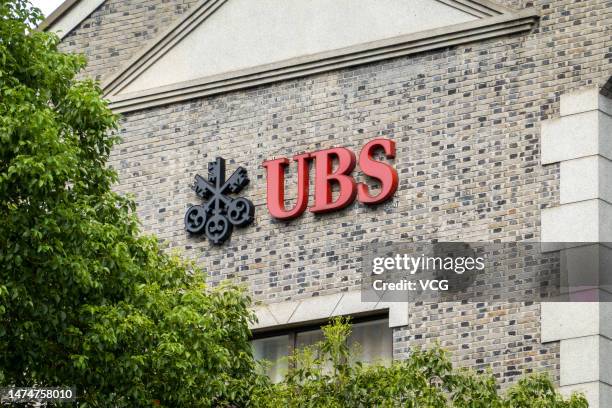 Logo of Swiss investment bank UBS AG is seen at Xintiandi Street on August 29, 2022 in Shanghai, China.