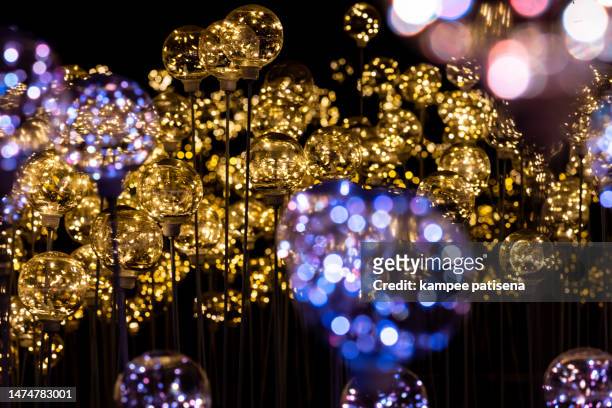 abstract illuminated light festival background - exploding confetti stock pictures, royalty-free photos & images