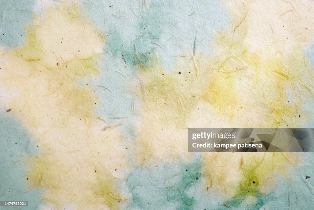 Handmade recycled mulberry paper watercolor paint background.
